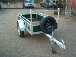 Trailer with wooden sidewalls price from 409,00 euro